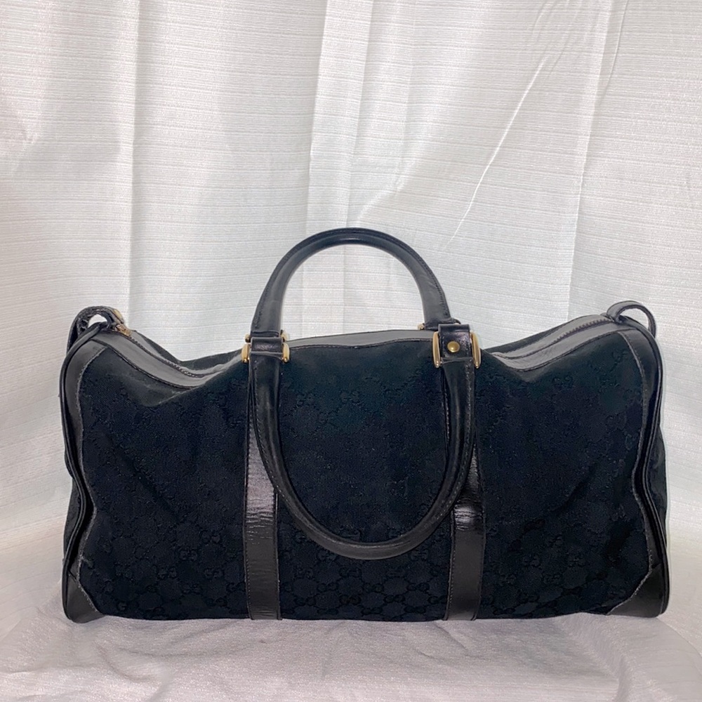 Gucci Duffle Bag in Black GG
Supreme Canvas and Leather